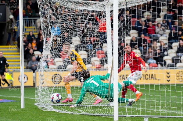 040223 - Newport County v Swindon Town - Sky Bet League 2 - Cameron Norman of Newport County (2) scores the first goal of the match