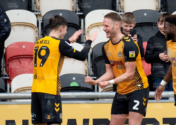 040223 - Newport County v Swindon Town - Sky Bet League 2 - Charlie McNeill of Newport County celebrates with goalscorer Cameron Norman of Newport County 