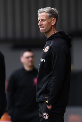 041025 - Newport County v Swindon Town - Sky Bet League 2 - Dejected Newport County Manager, David Hughes at full time