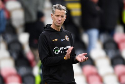 041025 - Newport County v Swindon Town - Sky Bet League 2 - Dejected Newport County Manager, David Hughes at full time