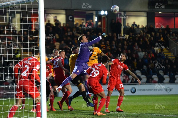 090419 - Newport County v Swindon Town - SkyBet League 2 - Luke McCormick of Swindon Town punches the ball away