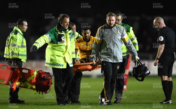 090419 - Newport County v Swindon Town - SkyBet League 2 - Joss Labadie of Newport County is stretchered off with an injury