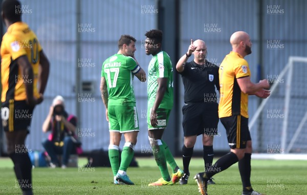 140418 - Newport County v Swindon Town - SkyBet League 2 - Rollin Menayese of Swindon Town is shown a red card