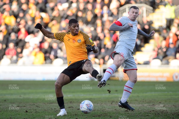 180120 - Newport County v Swindon Town - Sky Bet League 2 - Jamille Matt of Newport County is tackled by Paul Caddis of Swindon Town