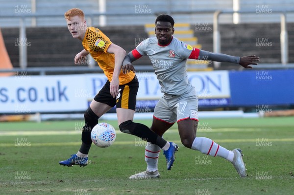 180120 - Newport County v Swindon Town - Sky Bet League 2 - Jordan Green of Newport County and Diallang Jaiyesimi of Swindon Town compete for the ball