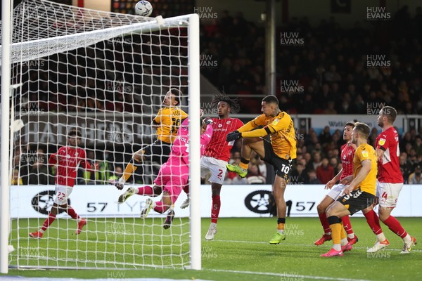201121 - Newport County v Swindon Town - Sky Bet League 2 - Dom Telford  and Courtney Baker-Richardson of Newport County attack the Swindon Town goal