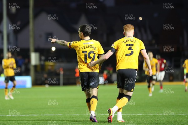 201121 - Newport County v Swindon Town - Sky Bet League 2 - Dom Telford and Ryan Haines of Newport County of Newport County  celebrate the Newport equaliser 