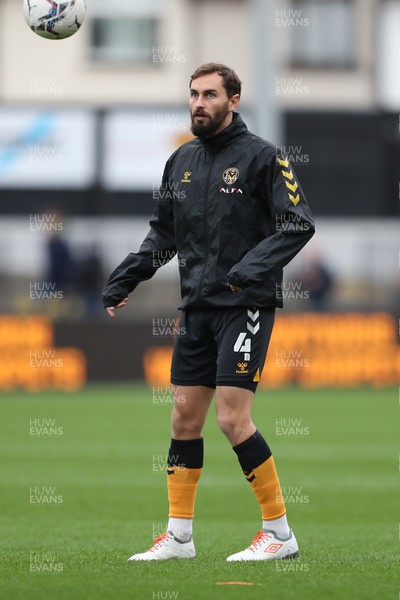 201121 - Newport County v Swindon Town - Sky Bet League 2 - Edward Upson of Newport County warms up before kick off