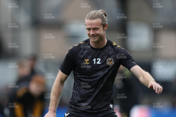 201121 - Newport County v Swindon Town - Sky Bet League 2 - Alex Fisher of Newport County warms up before kick off