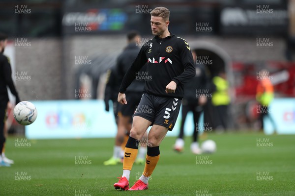 201121 - Newport County v Swindon Town - Sky Bet League 2 - James Clarke of Newport County  warms up before kick off