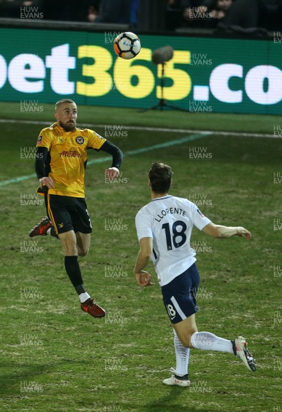 270118 - Newport County v Tottenham Hotspur - FA Cup - Mickey Demetriou of Newport County is challenged by Fernando Llorente of Tottenham Hotspur