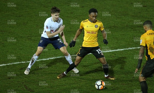 270118 - Newport County v Tottenham Hotspur - FA Cup - Shawn McCoulsky of Newport County is challenged by Juan Foyth of Tottenham Hotspur