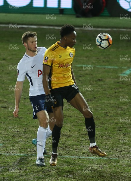 270118 - Newport County v Tottenham Hotspur - FA Cup - Shawn McCoulsky of Newport County is challenged by Eric Dier of Tottenham Hotspur