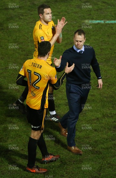 270118 - Newport County v Tottenham Hotspur - FA Cup - Newport Manager Michael Flynn with Ben Tozer at full time