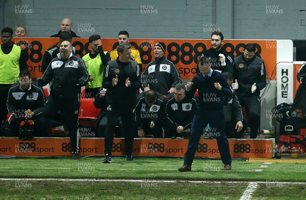 270118 - Newport County v Tottenham Hotspur - FA Cup - Newport Manager Michael Flynn and the bench celebrate at full time