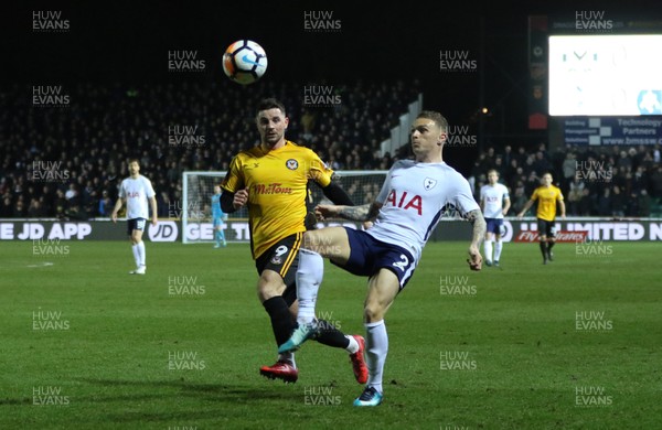 270118 - Newport County  v Tottenham Hotspur, Emirates FA Cup Fourth Round - Kieran Trippier of Tottenham Hotspur is challenged by Padraig Amond of Newport County