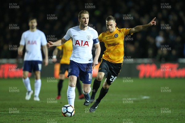 270118 - Newport County  v Tottenham Hotspur, Emirates FA Cup Fourth Round - Harry Kane of Tottenham Hotspur is challenged by Mickey Demetriou of Newport County