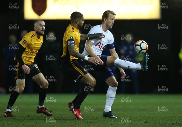 270118 - Newport County  v Tottenham Hotspur, Emirates FA Cup Fourth Round - Harry Kane of Tottenham Hotspur competes with Joss Labadie of Newport County to win the ball