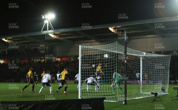 270118 - Newport County  v Tottenham Hotspur, Emirates FA Cup Fourth Round - Mickey Demetriou of Newport County tries to head at goal
