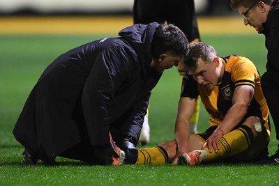 030326 - Newport County v Tranmere Rovers - Sky Bet League 2 - Sven Sprangler of Newport County receives treatment 