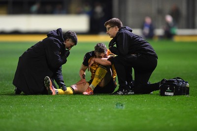 030326 - Newport County v Tranmere Rovers - Sky Bet League 2 - Sven Sprangler of Newport County receives treatment 
