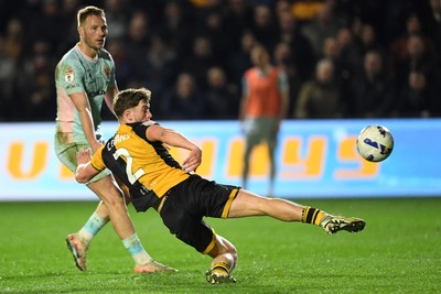 030326 - Newport County v Tranmere Rovers - Sky Bet League 2 - Cameron Evans of Newport County scores a goal