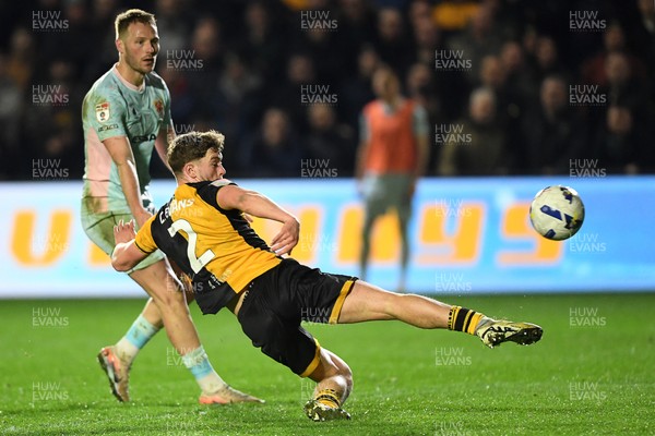 030326 - Newport County v Tranmere Rovers - Sky Bet League 2 - Cameron Evans of Newport County scores a goal