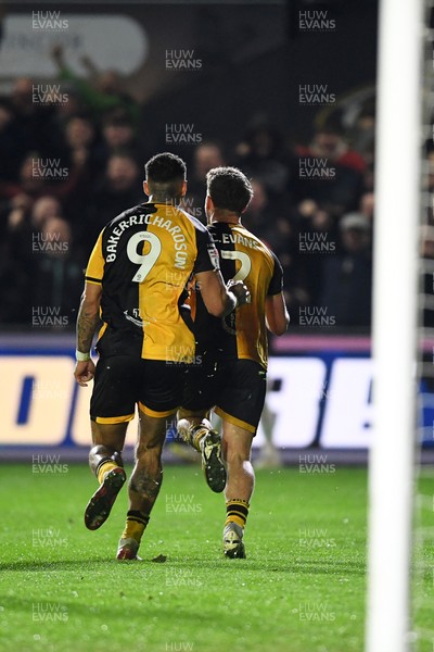 030326 - Newport County v Tranmere Rovers - Sky Bet League 2 - Cameron Evans of Newport County celebrates scoring a goal with team mates