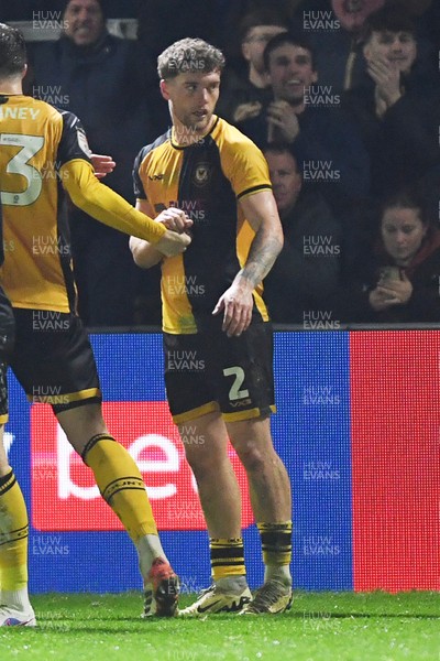 030326 - Newport County v Tranmere Rovers - Sky Bet League 2 - Cameron Evans of Newport County celebrates scoring a goal with team mates