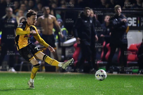 030326 - Newport County v Tranmere Rovers - Sky Bet League 2 - Michael Spellman of Newport County scores a goal from distance