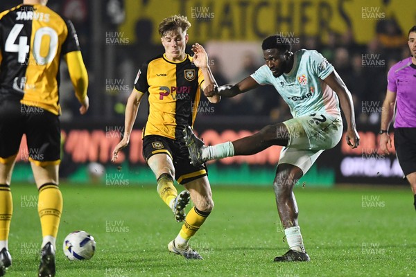 030326 - Newport County v Tranmere Rovers - Sky Bet League 2 - Tom Davies of Newport County is challenged by Nohan Kenneh of Tranmere