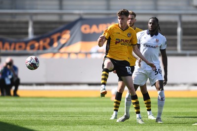 030525 - Newport County v Tranmere Rovers - Sky Bet League 2 - Joe Thomas of Newport County is challenged by Omari Patrick of Tranmere Rovers