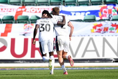 030525 - Newport County v Tranmere Rovers - Sky Bet League 2 - Omari Patrick of Tranmere Rovers celebrates scoring a goal with team mates