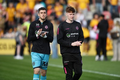 030525 - Newport County v Tranmere Rovers - Sky Bet League 2 - Lewis Webb and Jacob Carney of Newport County at full time