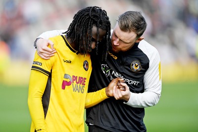 030525 - Newport County v Tranmere Rovers - Sky Bet League 2 - Mark O’Brien speaks with dejected Cameron Antwi of Newport County at full time