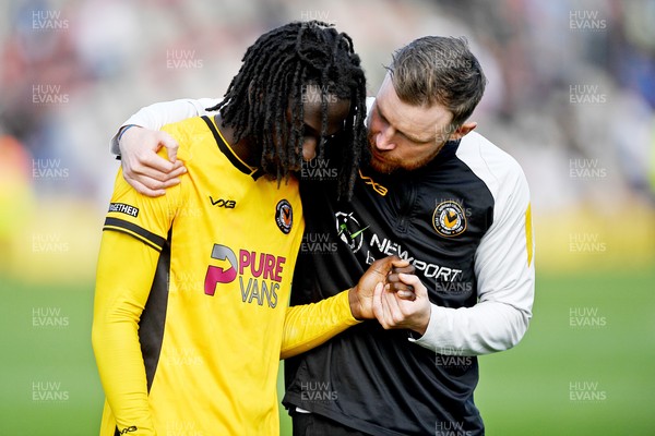 030525 - Newport County v Tranmere Rovers - Sky Bet League 2 - Mark O’Brien speaks with dejected Cameron Antwi of Newport County at full time