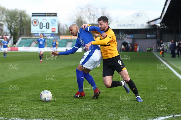 060419 Newport County v Tranmere Rovers - Sky Bet League 2 - Padraig Amond of Newport County takes on Jake Caprice of Tranmere Rovers 