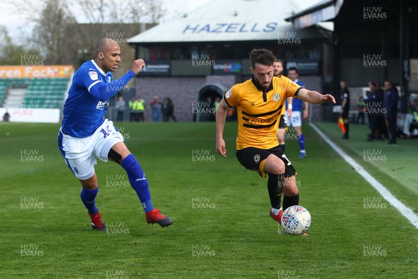 060419 Newport County v Tranmere Rovers - Sky Bet League 2 - Josh Sheehan of Newport County takes on Jake Caprice of Tranmere Rovers 