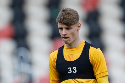 130424 - Newport County v Tranmere Rovers - Sky Bet League 2 -  Matty Bondswell of Newport County warming up 