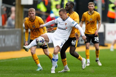 130424 - Newport County v Tranmere Rovers - Sky Bet League 2 -  Nelson Sanca of Newport County and Luke Norris of Tranmere Rovers