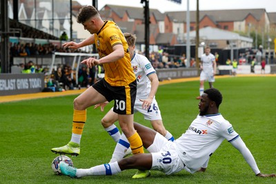 130424 - Newport County v Tranmere Rovers - Sky Bet League 2 -  Seb Palmer-Houlden of Newport County and Jean Leroy-Belehouan of Tranmere Rovers