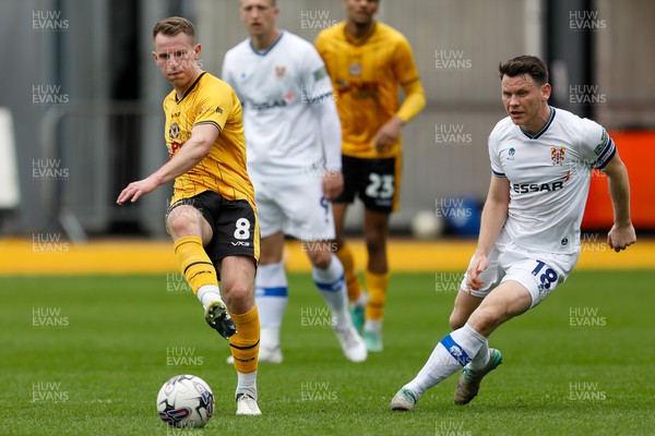 130424 - Newport County v Tranmere Rovers - Sky Bet League 2 -  Bryn Morris of Newport County and Connor Jennings of Tranmere Rovers