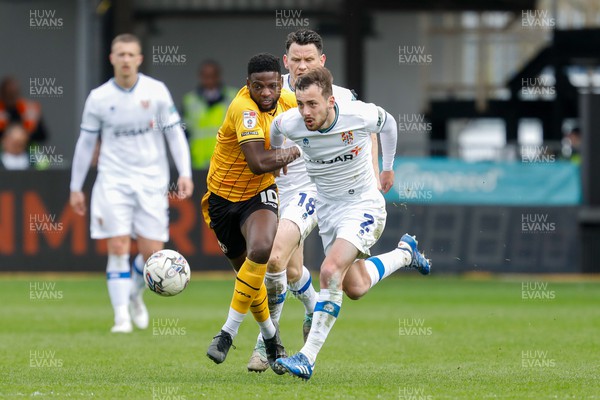 130424 - Newport County v Tranmere Rovers - Sky Bet League 2 -  Offrande Zanzala of Newport County and Lee O'Connor of Tranmere Rovers