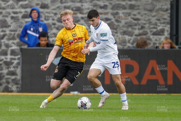 130424 - Newport County v Tranmere Rovers - Sky Bet League 2 -  Will Evans of Newport County and Rob Apter of Tranmere Rovers 