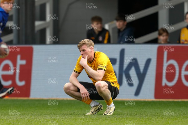 130424 - Newport County v Tranmere Rovers - Sky Bet League 2 -  Will Evans of Newport County looks dejected after game