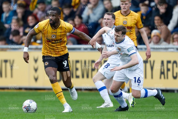 130424 - Newport County v Tranmere Rovers - Sky Bet League 2 -  Omar Bogle of Newport County and Chris Merrie of Tranmere Rovers 