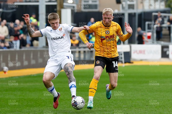130424 - Newport County v Tranmere Rovers - Sky Bet League 2 -  Harrison Bright of Newport County and Josh Hawkes of Tranmere Rovers