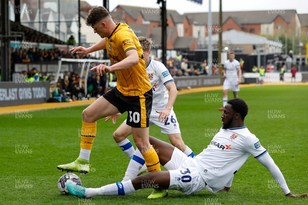 130424 - Newport County v Tranmere Rovers - Sky Bet League 2 -  Seb Palmer-Houlden of Newport County and Jean Leroy-Belehouan of Tranmere Rovers