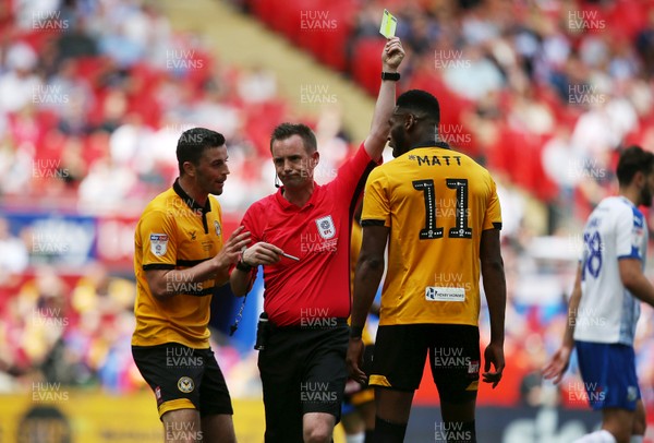 250519 - Newport County v Tranmere Rovers - SkyBet League Two Play-off Final - Jamille Matt of Newport County is given a yellow card