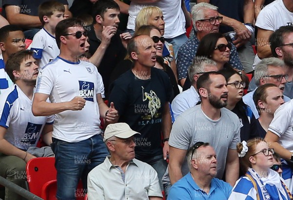 250519 - Newport County v Tranmere Rovers - SkyBet League Two Play-off Final - Premier League Referee Mike Dean in the crowd with the Tranmere fans